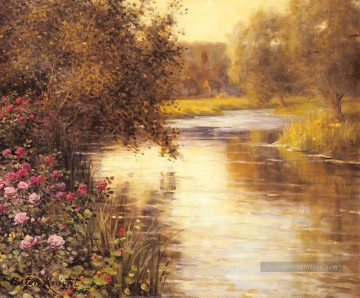 Printemps des fleurs le long d’une rivière méandres Louis Aston Knight Peinture à l'huile